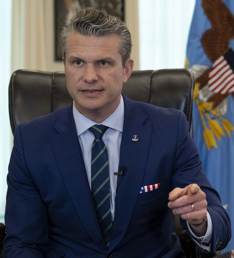 Secretary of Defense Pete Hegseth signs a memorandum regarding the discharge of U.S. service members who refused to take the COVID-19 vaccine at the Pentagon, Washington, D.C., Apr